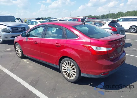 2012 Ford Focus Titanium z USA, uszkodzony, nr VIN 1FAHP3J21CL258049